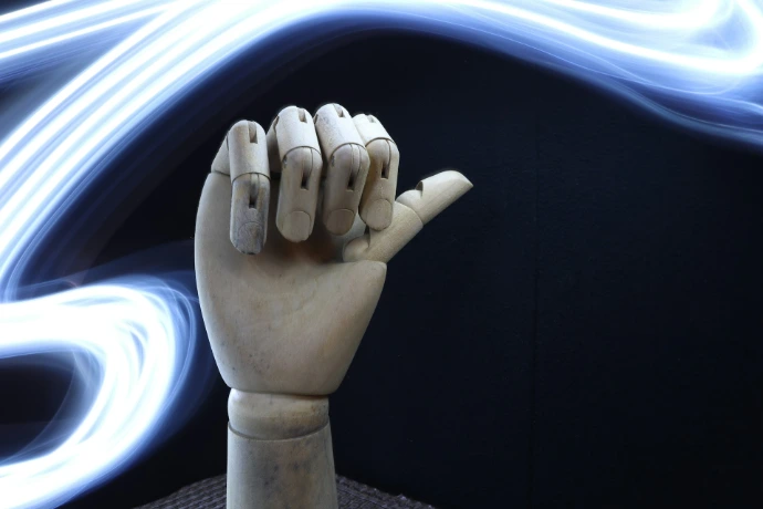 A sculpture of a hand making a gesture